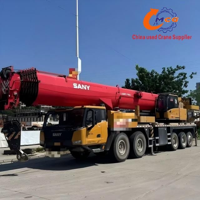 Used 2023 Sany 130-ton 8-section boom STC1300C8-6 truck crane in excellent condition.