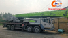 A reliable 2020 Zoomlion 55-ton, 5-section boom used truck crane at a reasonable price and in excellent condition.