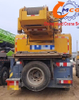 A used 2018 XCMG 100-ton 6-section boom truck crane in good condition and at a reasonable price.